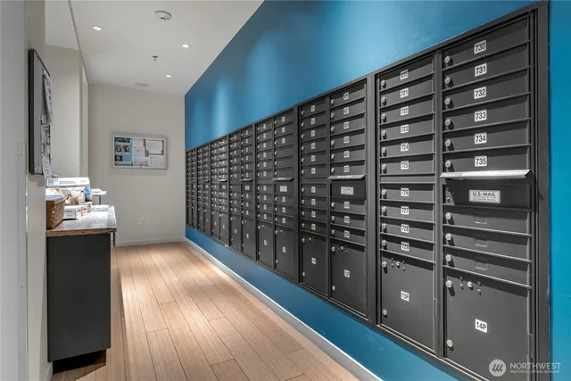 a kitchen with granite countertop a refrigerator and a stove