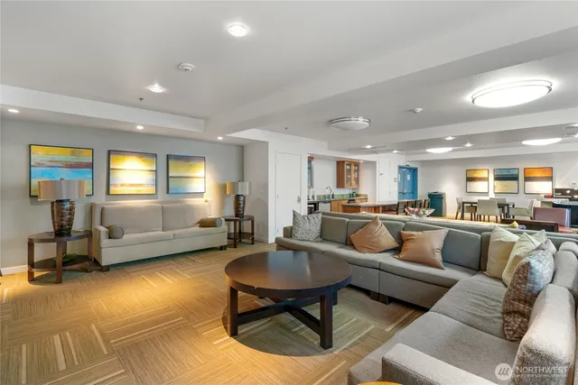a living room with furniture and a table