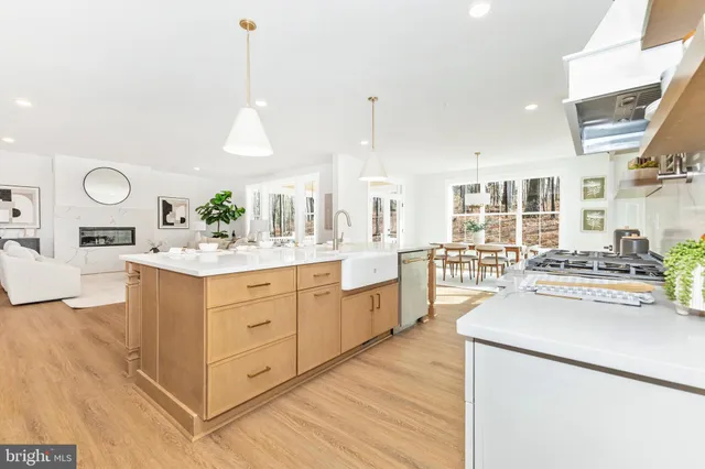 a view of a dining room with furniture and windows