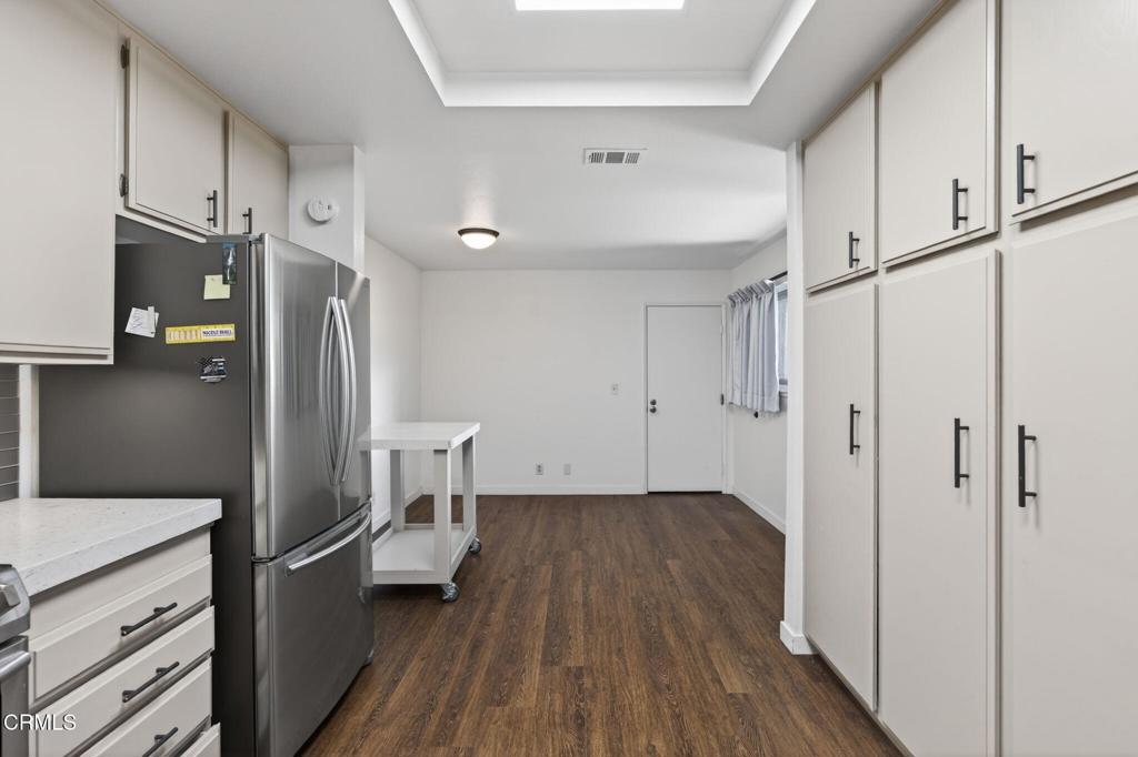 449 Reed Way Port Hueneme, CA 93041 - Photo 15 of 42 a view of a kitchen with a dishwasher and a refrigerator