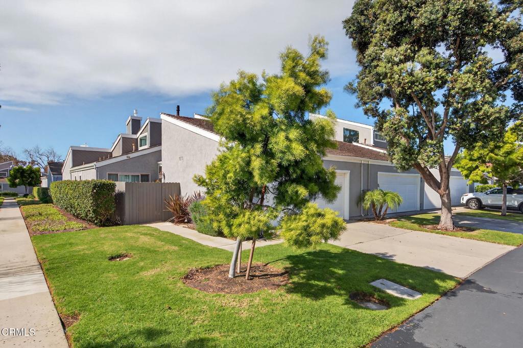 449 Reed Way Port Hueneme, CA 93041 - Photo 2 of 42 a view of a house with a yard and potted plants