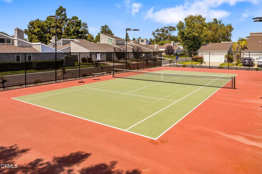 449 Reed Way Port Hueneme, CA 93041 - Photo 40 of 42 a view of a tennis ground with large trees