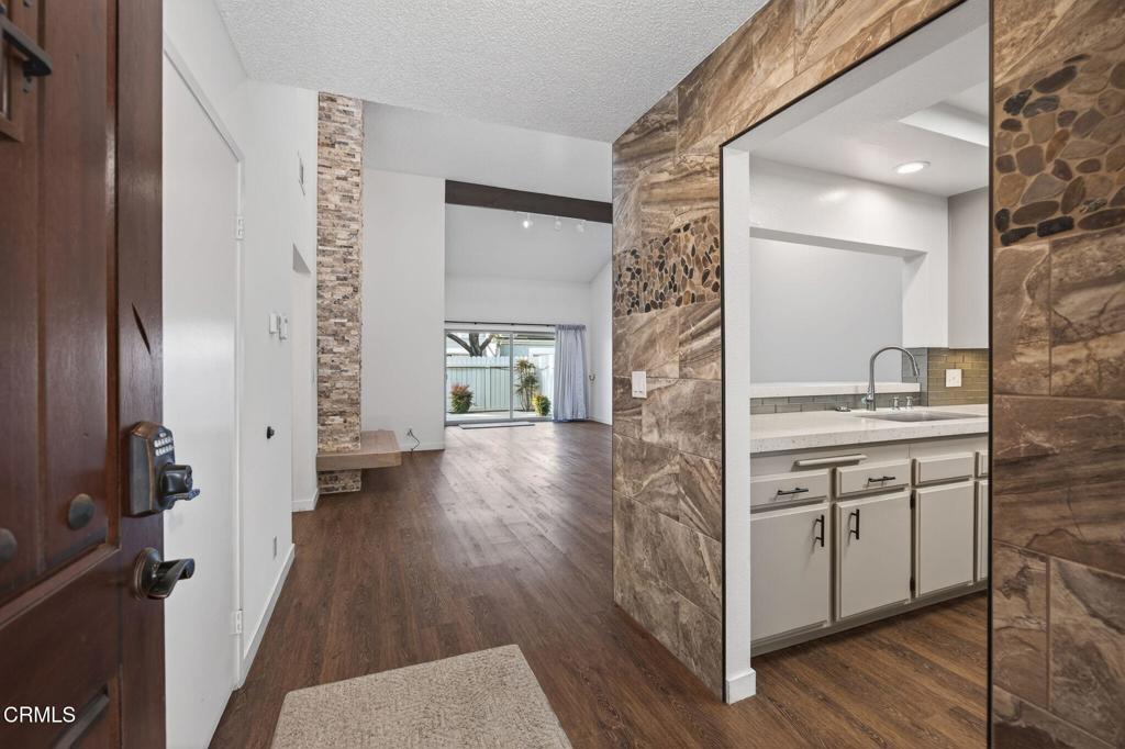 449 Reed Way Port Hueneme, CA 93041 - Photo 8 of 42 a bathroom with a sink and a mirror