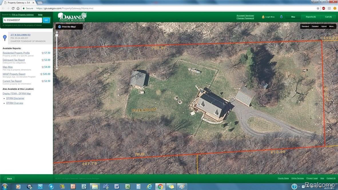 277 North Baldwin Road Oxford, MI 48371 - Photo 2 of 45 3.79 ACRES TUCKED INTO WOODED SETTING - CIRCLE DRIVE, TREE-LINED DRIVE IN W/ SECURITY GATE