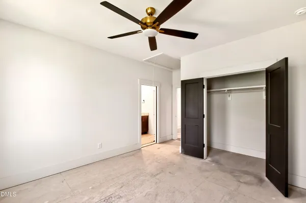 a kitchen with a sink and a stove top oven