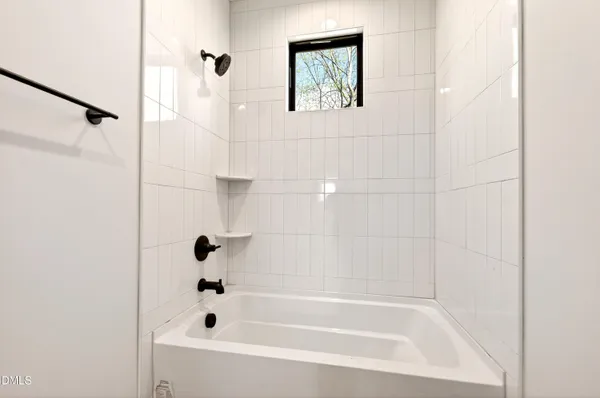 a view of house with yard