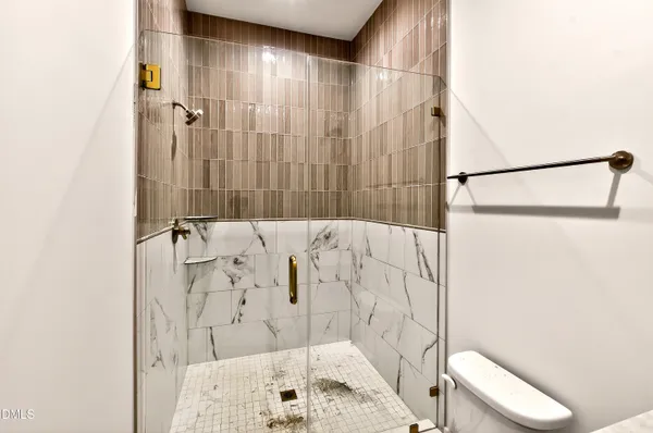 an aerial view of houses with yard