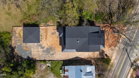 an aerial view of houses with yard