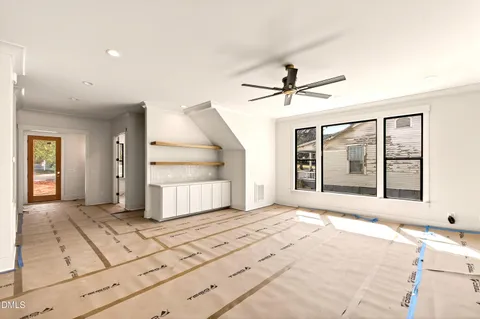 a view of an empty room with a window