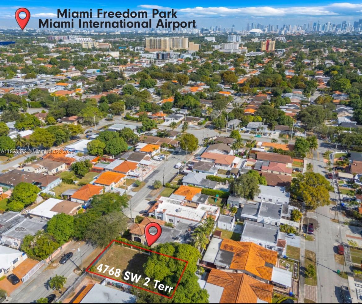 4768 Southwest 2nd Terrace Miami, FL 33134 - Photo 4 of 16 an aerial view of residential houses with outdoor space and parking