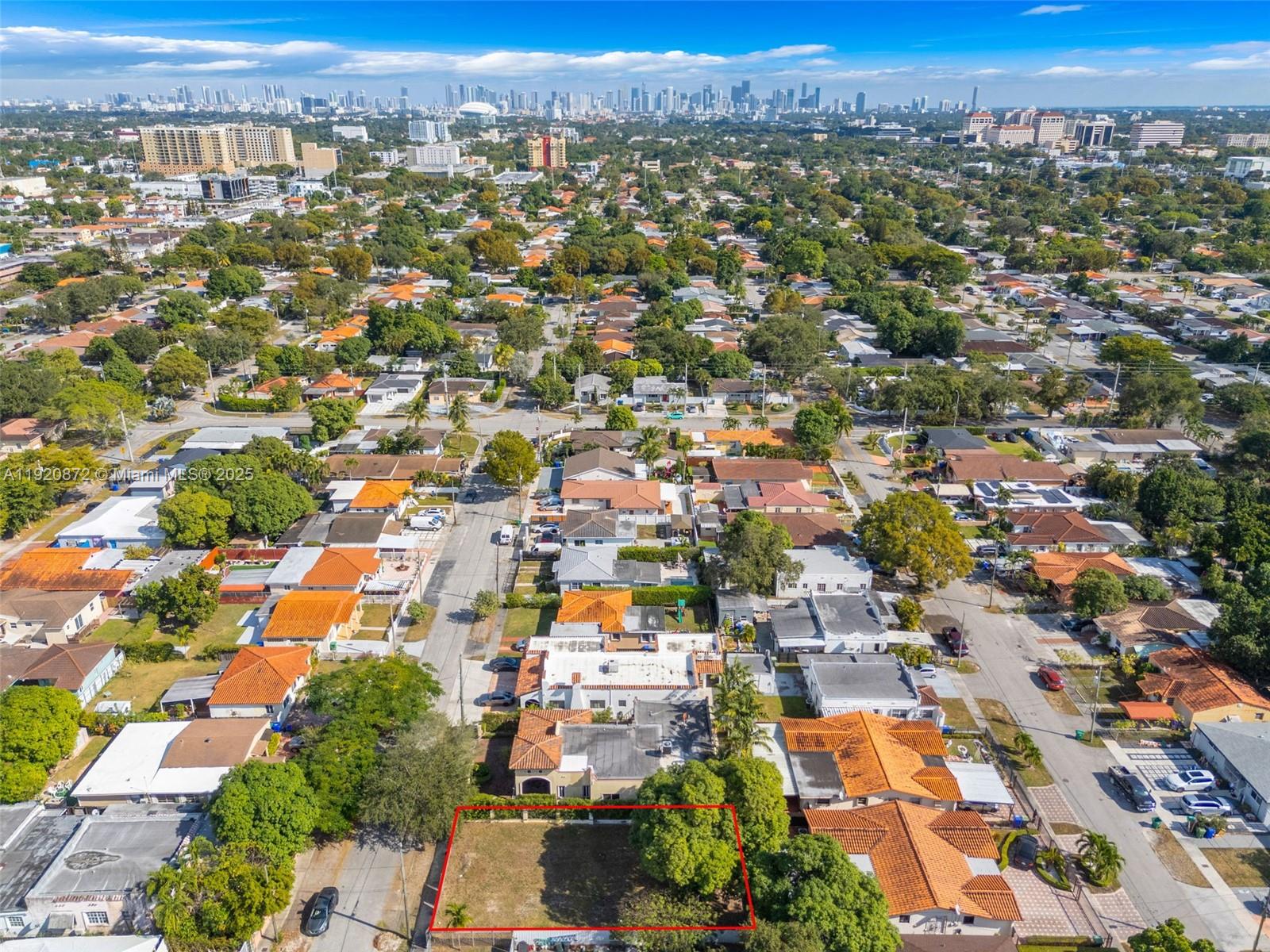 4768 Southwest 2nd Terrace Miami, FL 33134 - Photo 6 of 16 an aerial view of residential houses with city view