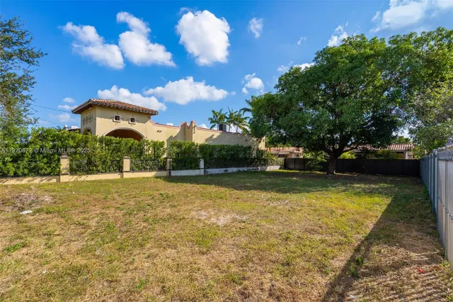a view of a house with swimming pool