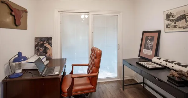 a view of a workspace with furniture