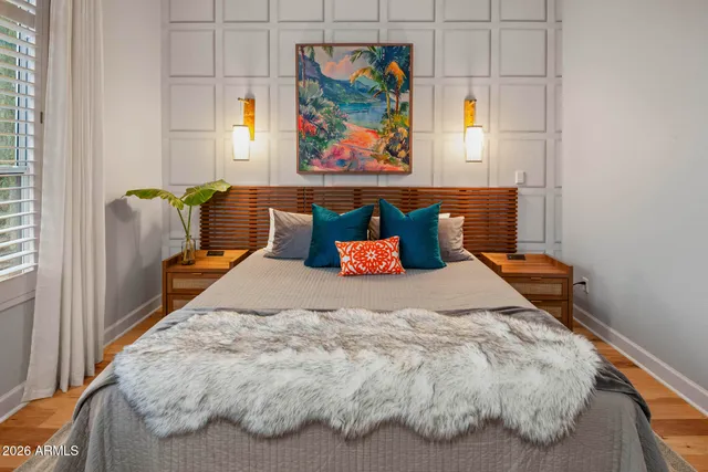 a bathroom with a sink toilet vanity and shower