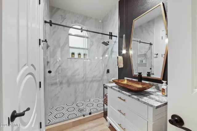 a view of a swimming pool with outdoor seating