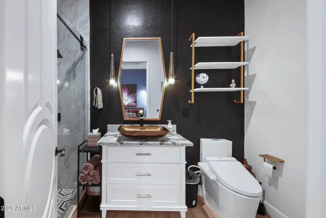 a view of living room filled with furniture and floor to ceiling window