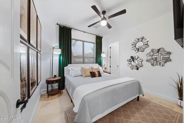 a view of a white building with swimming pool