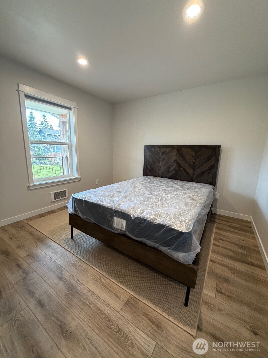 997 King Johns Way Forks, WA 98331 - Photo 11 of 39 a bedroom with a bed and window