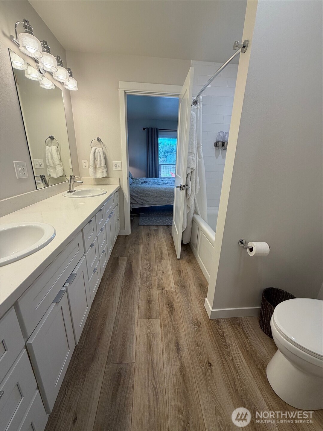 997 King Johns Way Forks, WA 98331 - Photo 13 of 39 a bathroom with a sink a toilet and a mirror