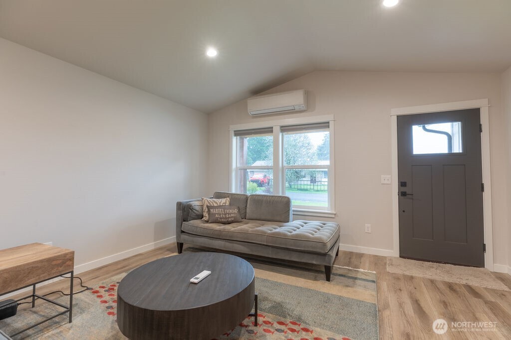 997 King Johns Way Forks, WA 98331 - Photo 18 of 39 a living room with furniture and a window