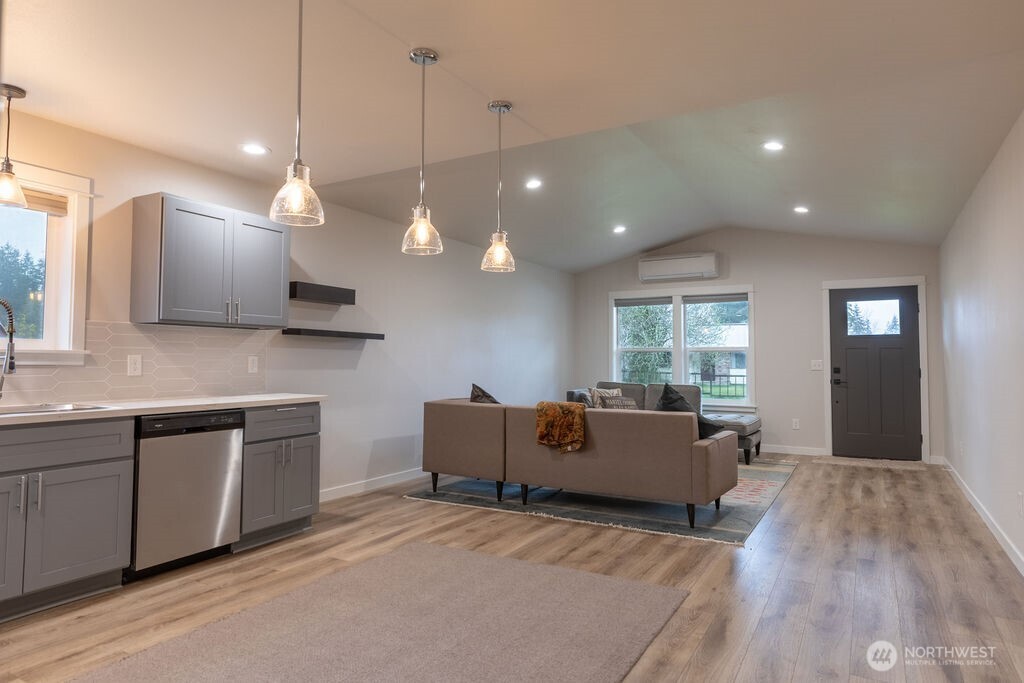 997 King Johns Way Forks, WA 98331 - Photo 20 of 39 a large room with kitchen island a large island in it