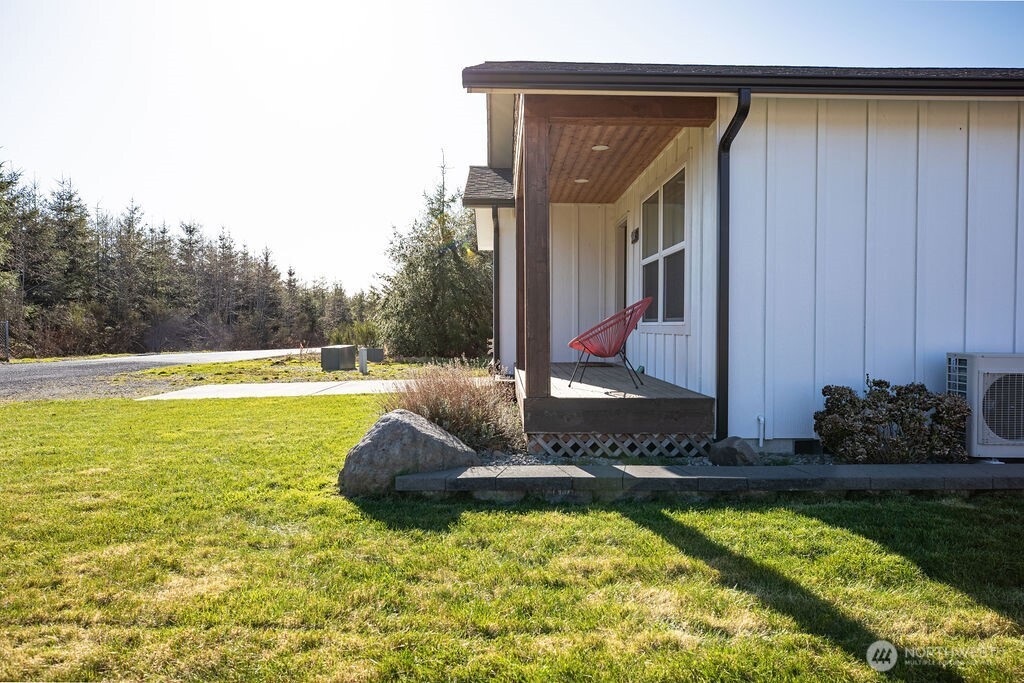 997 King Johns Way Forks, WA 98331 - Photo 21 of 39 a view of a house with backyard and sitting area