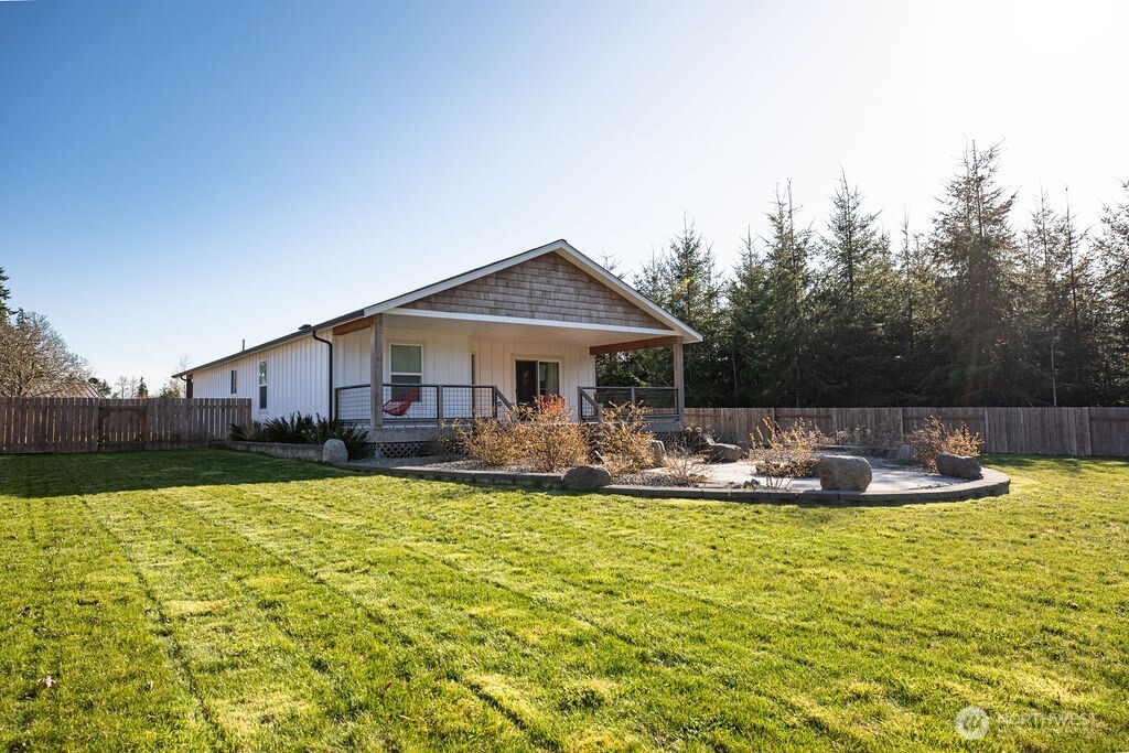 997 King Johns Way Forks, WA 98331 - Photo 25 of 39 a view of house with swimming pool and yard