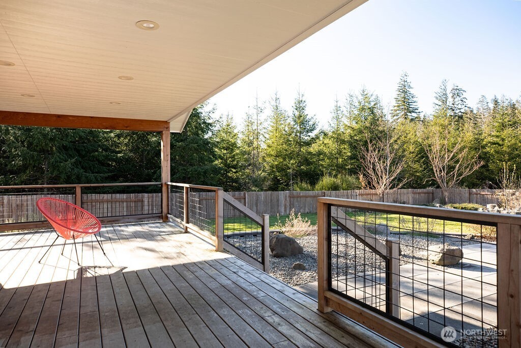 997 King Johns Way Forks, WA 98331 - Photo 28 of 39 a view of deck with chairs and wooden floor