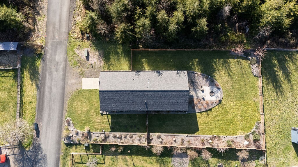 997 King Johns Way Forks, WA 98331 - Photo 32 of 39 a aerial view of a house with a yard