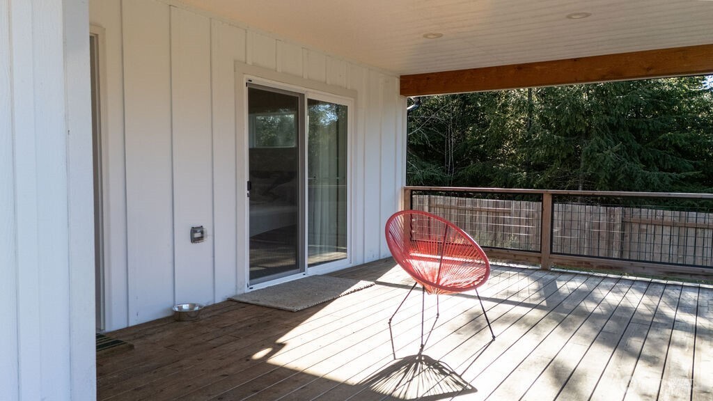 997 King Johns Way Forks, WA 98331 - Photo 38 of 39 a view of a chair and table in the balcony