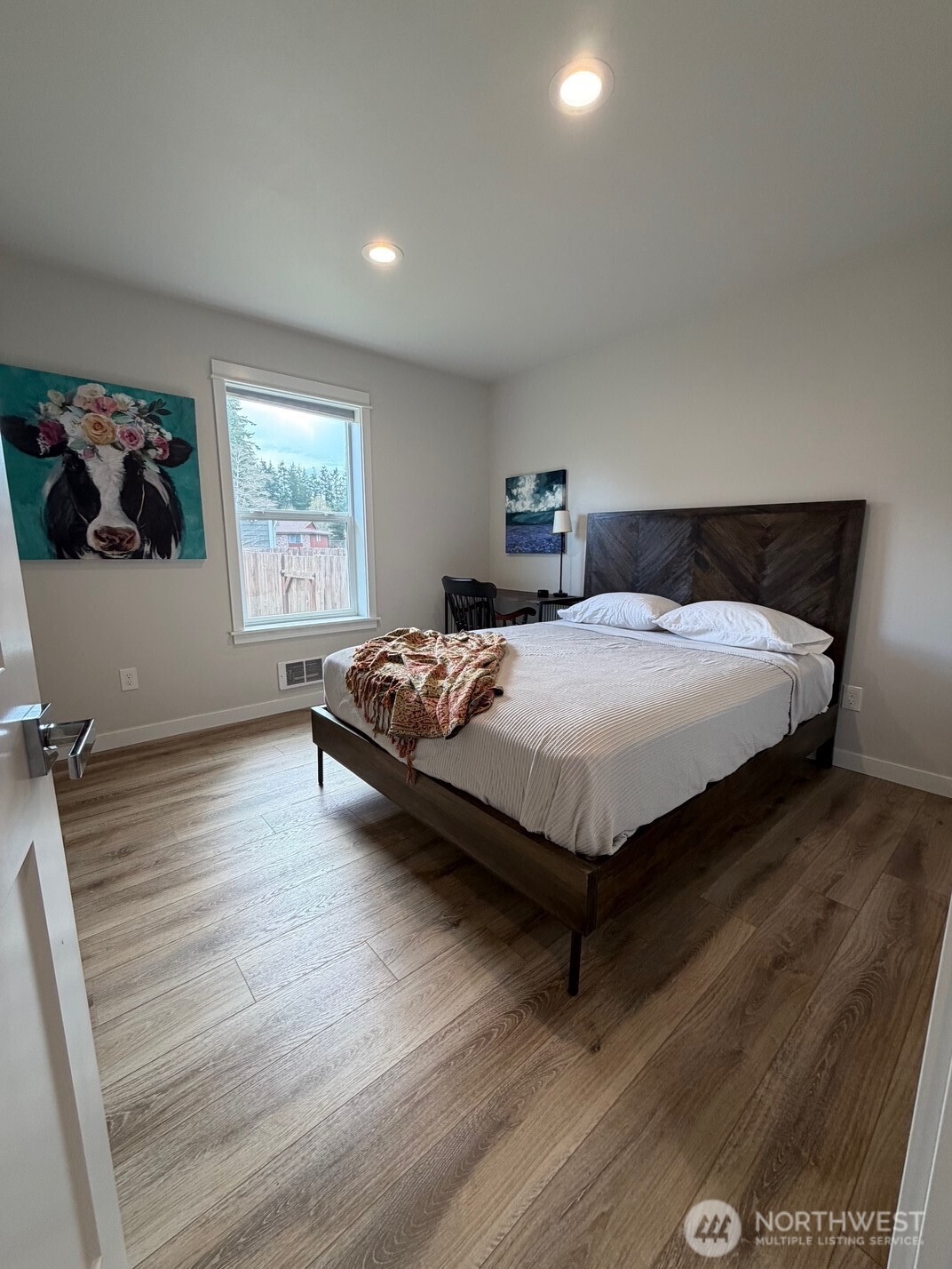 997 King Johns Way Forks, WA 98331 - Photo 10 of 39 a bedroom with a bed lamp closet and window