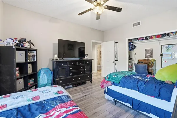 a bedroom with a bed and furniture