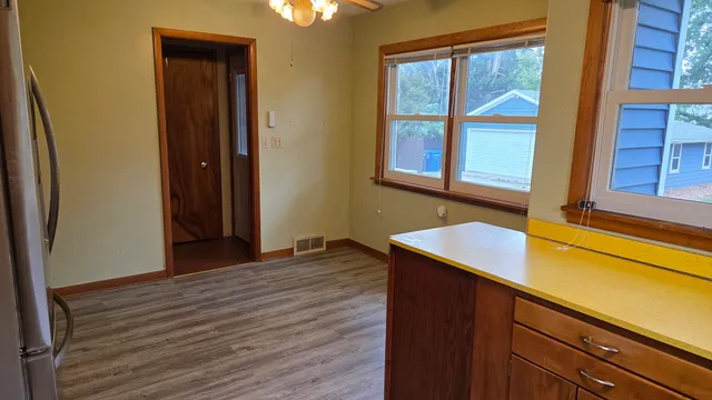 a kitchen with a sink and a window