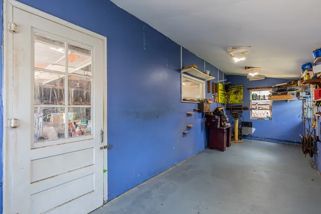 a view of an house with backyard space and garden