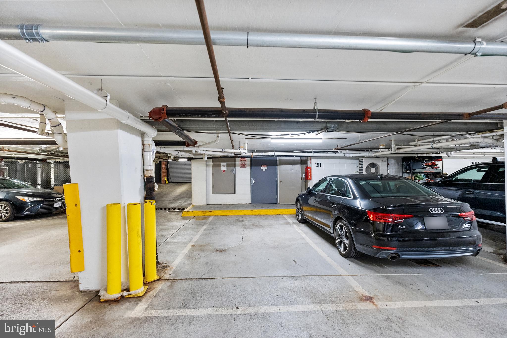 3210 Grace Street Northwest, Unit 304 Washington, DC 20007 - Photo 32 of 41 a car parked in a garage