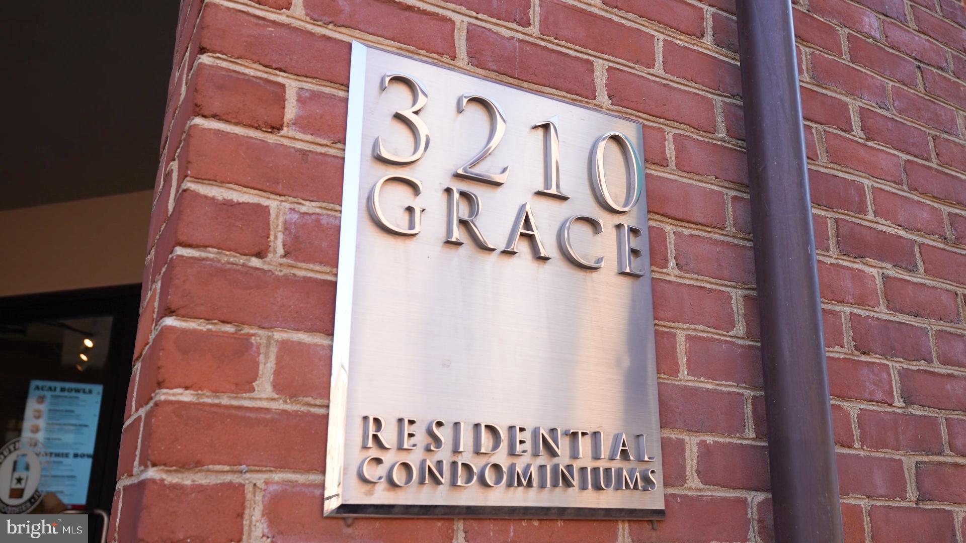 3210 Grace Street Northwest, Unit 304 Washington, DC 20007 - Photo 34 of 41 a sign on a brick wall