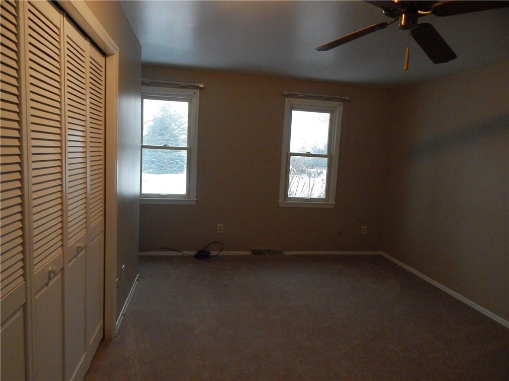 220 Falls Village Road Pittsburgh, PA 15239 - Photo 13 of 24 MASTER BEDROOM WITH PADDLE FAN,NEW CLOSET DOORS, NEW NEUTRALWALL TO WALL. FRESHLY PAINTED!