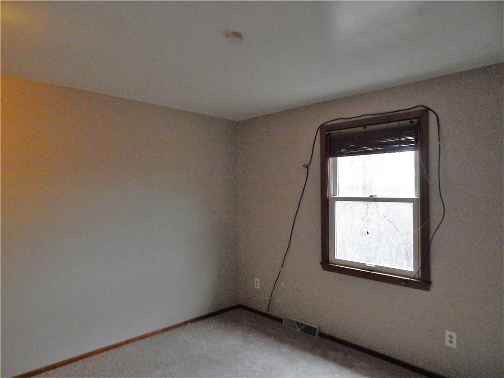 220 Falls Village Road Pittsburgh, PA 15239 - Photo 18 of 24 THIRD BEDROOM, NEW NEUTRALWALL TO WALL AND FRESHLY PAINTED.