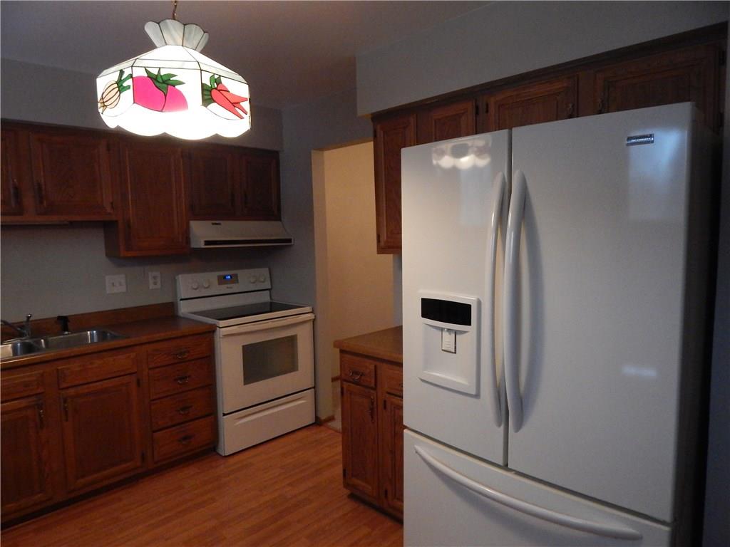 220 Falls Village Road Pittsburgh, PA 15239 - Photo 8 of 24 ANOTHER VIEW OF THE EAT-IN-KITCHEN.REFRIGERATOR ALSO INCLUDED.