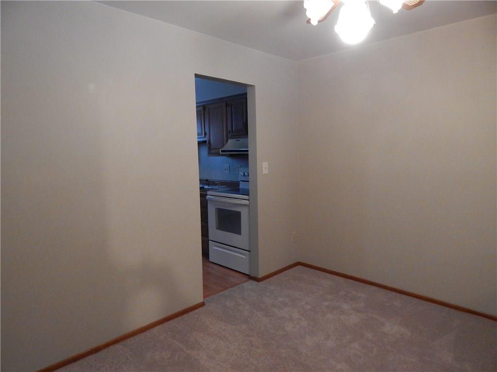 220 Falls Village Road Pittsburgh, PA 15239 - Photo 9 of 24 DINING ROOM OFF THE KITCHEN,NEW NEUTRAL WALL TO WALL.