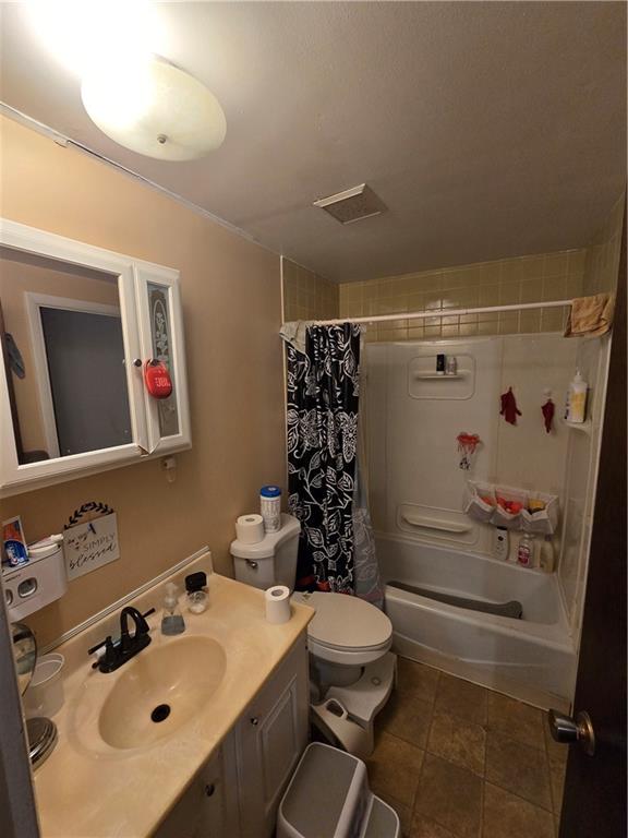 3184 Ladoga Street Pittsburgh, PA 15204 - Photo 13 of 22 a bathroom with a sink mirror vanity and toilet