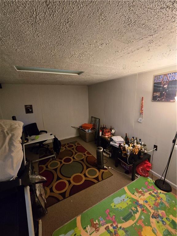 3184 Ladoga Street Pittsburgh, PA 15204 - Photo 16 of 22 a room with furniture a rug and wooden floor