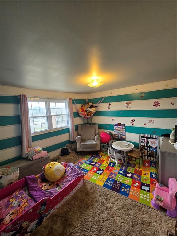 3184 Ladoga Street Pittsburgh, PA 15204 - Photo 10 of 22 a room with lots of baby toys and wooden floor