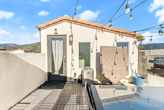 a front view of a house with a outdoor space