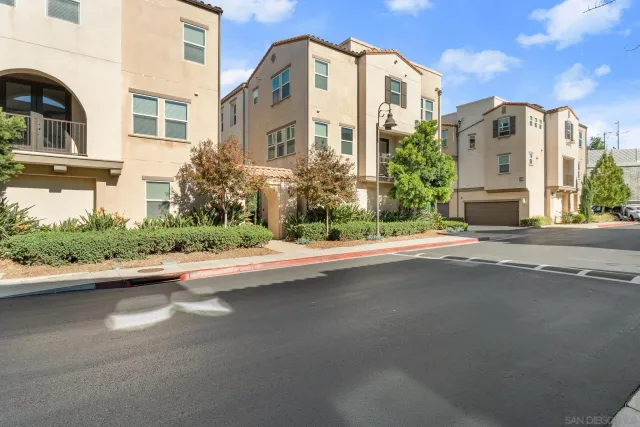 a front view of a house with yard