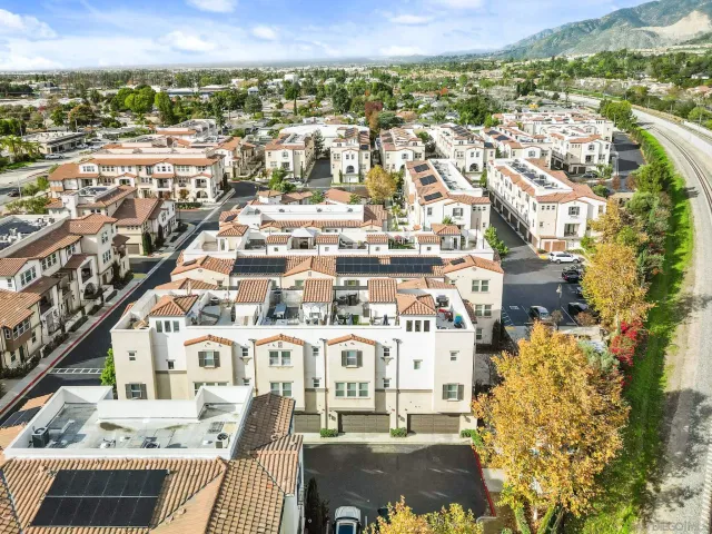 an aerial view of residential building with parking space