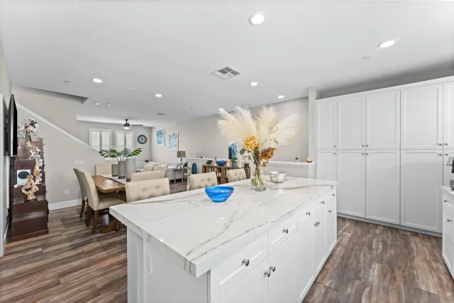 a view of kitchen with sink and living room