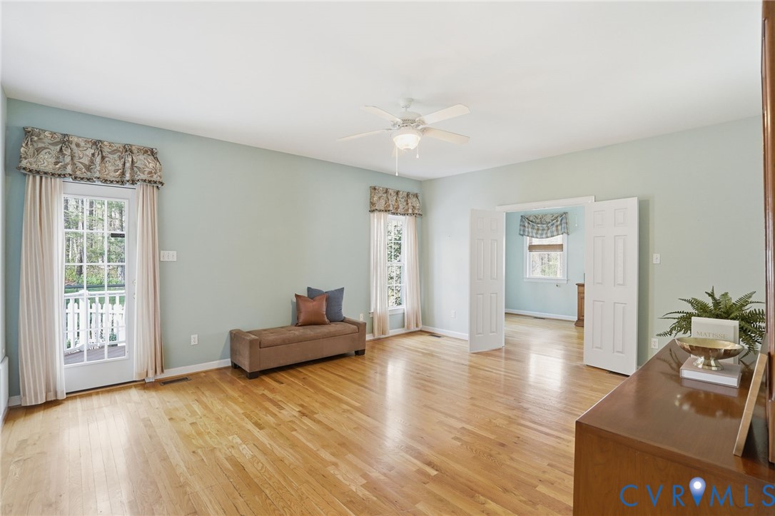 14430 Overlook Ridge Lane Beaverdam, VA 23015 - Photo 29 of 71 a living room with furniture and wooden floor