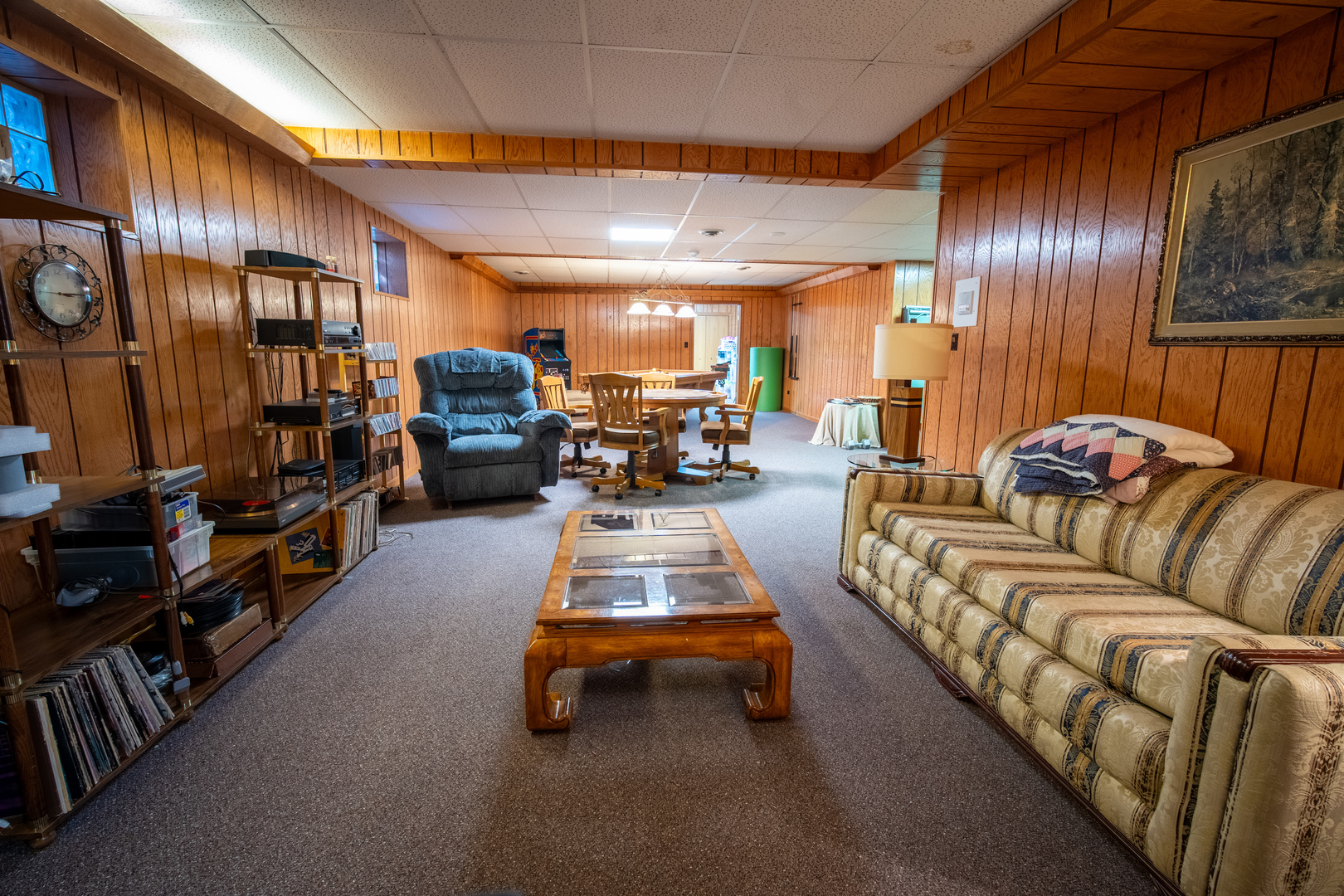 3065 182nd Place Lansing, IL 60438 - Photo 19 of 38 a living room with furniture and a chandelier