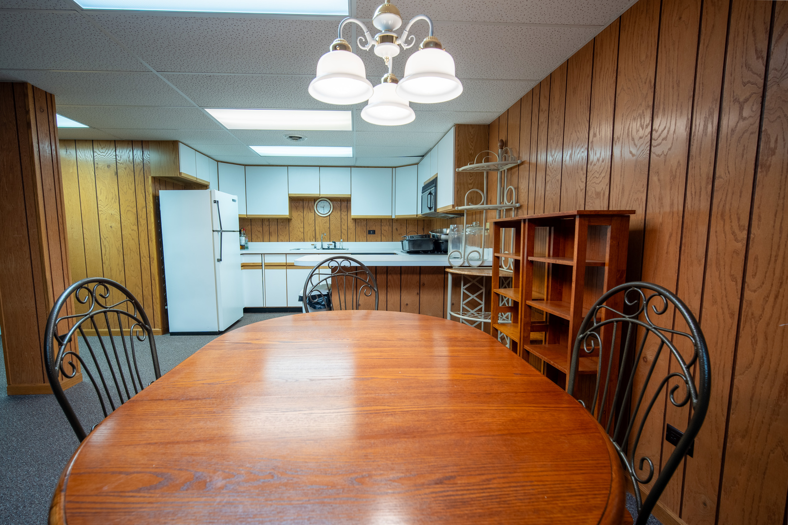 3065 182nd Place Lansing, IL 60438 - Photo 20 of 38 a kitchen with stainless steel appliances granite countertop a refrigerator a stove top oven a sink dishwasher and wooden cabinets